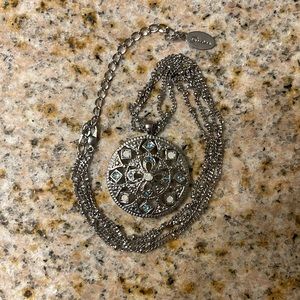 Guess silver necklace with circle pendant